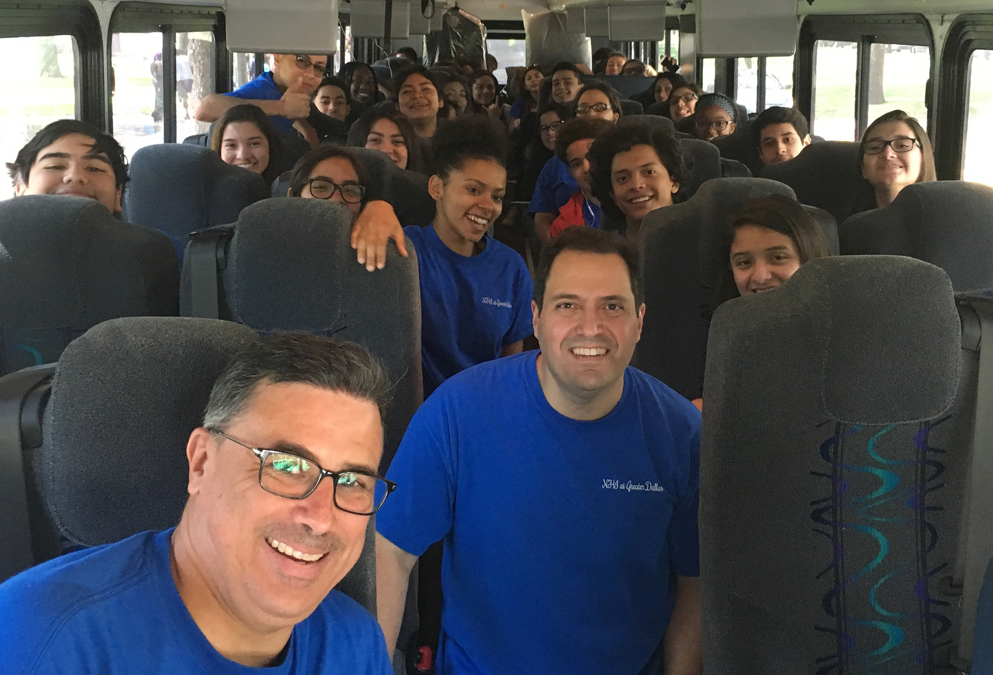 George Rodriguez with Greater Dallas NHI debaters