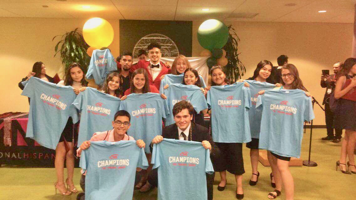 The 2019 International CWS Thought Series winners pose with shirts declaring them such