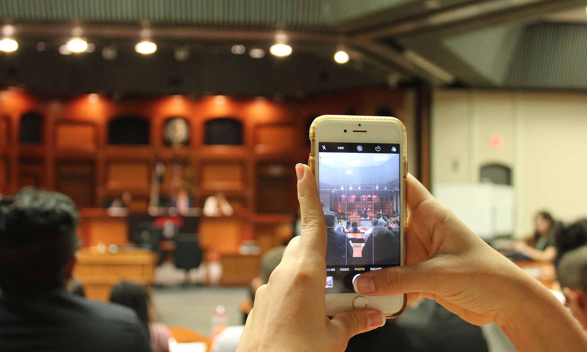 student capturing ldz on phone